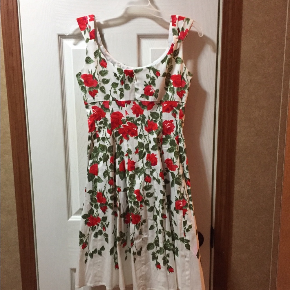 Lovely white dress with roses.